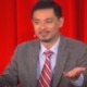 Matthew Liao auf einer Bühne